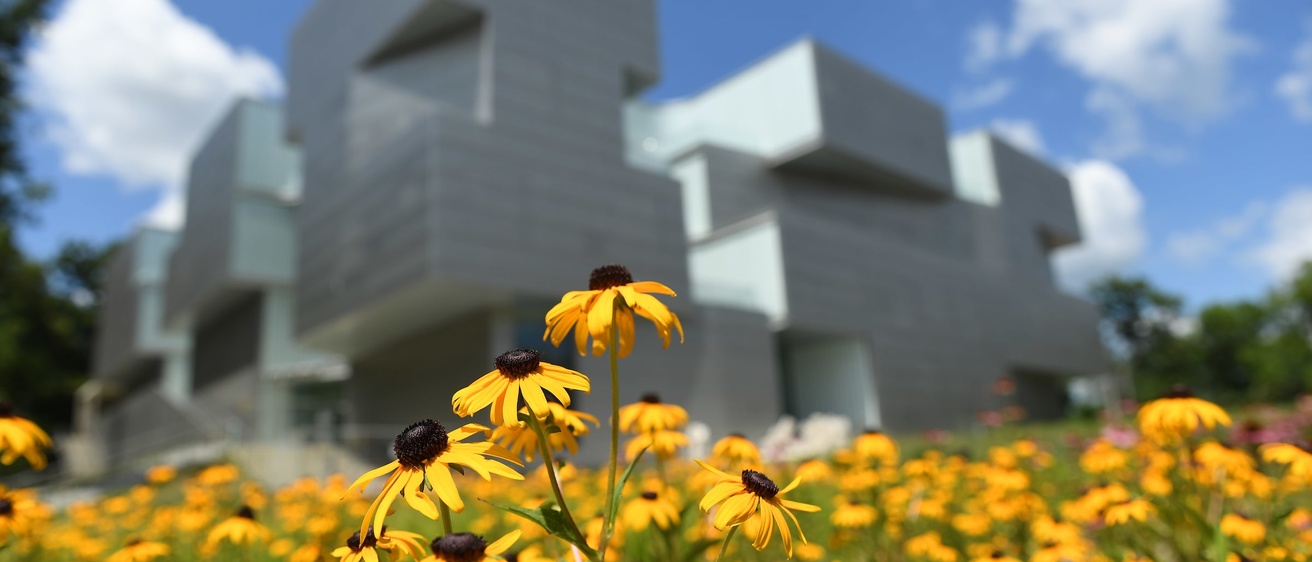 Flowers in front of University of Iowa art building