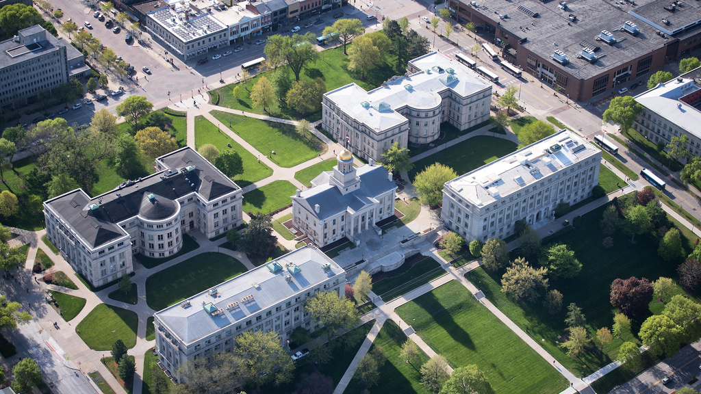 Aerial photo of old capitol and surrounding buildings at University of Iowa